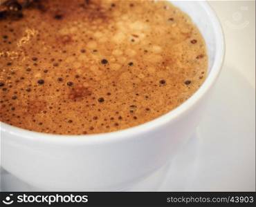 top view of coffee in white cup