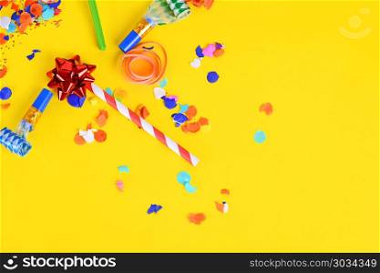 Top view of colorful party confetti background with place for text. Celebration concept. Top view of colorful party confetti background