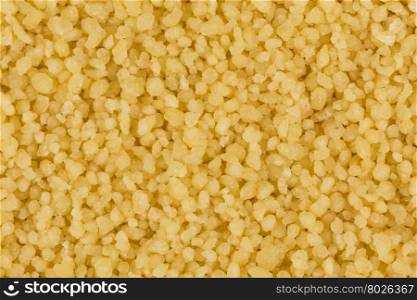 Top view of couscous as background texture