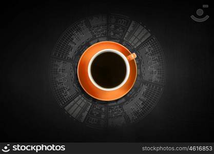 Top view of cup of coffee on dark background. Coffee time