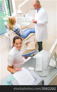 Top view of dental surgery professional team dentist consulting patient