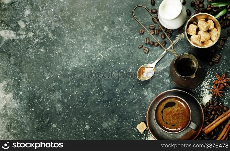 Top view of Espresso coffee, milk and sugar on black marble table. Background with space for text.