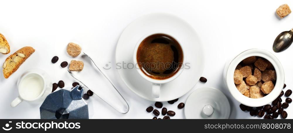 Top view of Espresso coffee, milk and sugar on white. Background with space for text