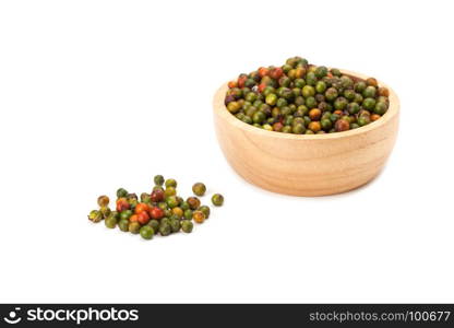 top view of fresh peppercorns in wooden bowl on white background