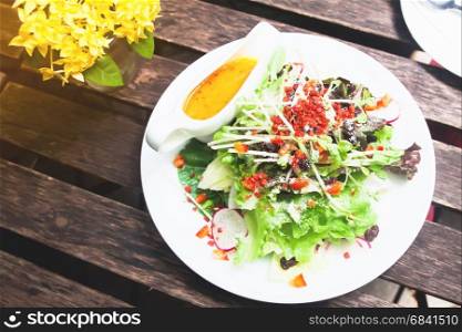 Top view of Healthy Salad on wooden table, Healthy lifestyle concept