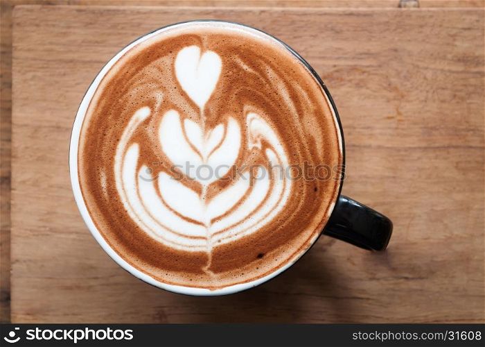 Top view of hot coffee on wooden table, stock photo