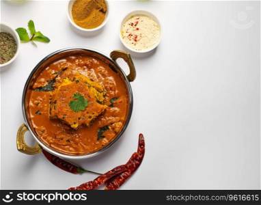 top view of Indian food with spices on white background