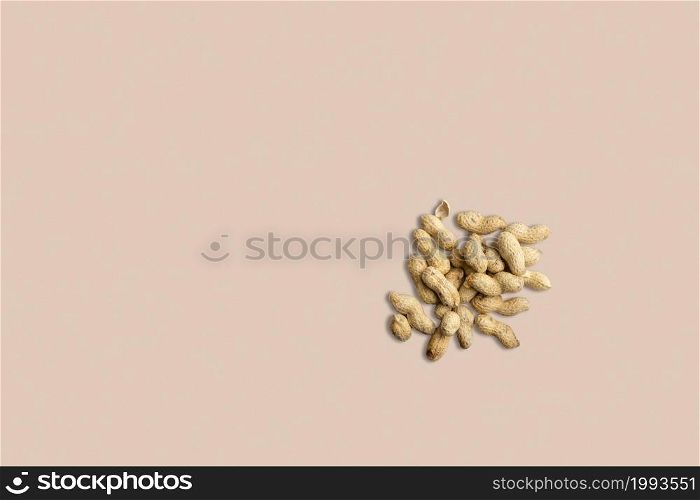 Top view of isolated raw peanuts , close up peanut photo. Close up photo of top view peanuts, raw peanuts in the nutshells