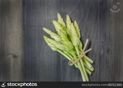 top view of Moonflower (Ipomoea alba L.) on wooden background, Free space for text