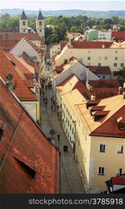 Top view of Old Town street of Regensburg at sunset. Germany