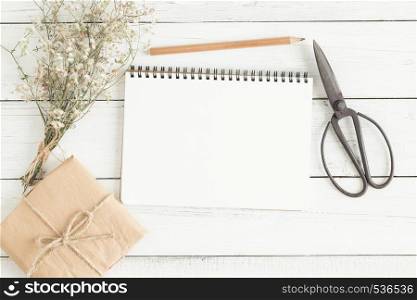 top view of open book with pencil,flat lay image of workplace with empty notebook