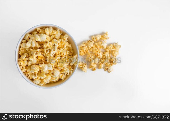 top view of popcorn in a box isolated on white
