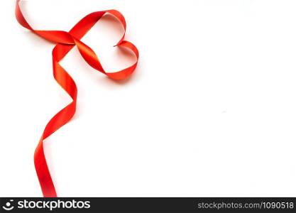 Top view of ribbon shaped as heart isolated on white background. Valentine&rsquo;s day concept. Copyspace. Top view of ribbon shaped as heart isolated on white background. Valentine&rsquo;s day concept