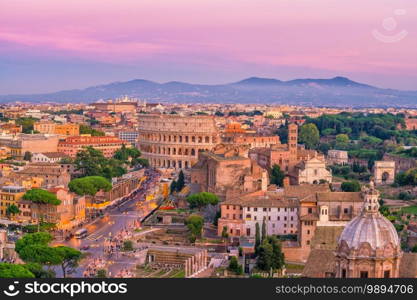 Top view of  Rome city skyline with Colosseum from Castel Sant’Angelo, Italy.