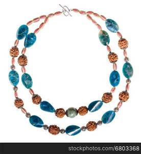 top view of round necklace from kyanite and serpentine natural gem stones, ceramic beads, rudraksha tree seeds isolated on white background