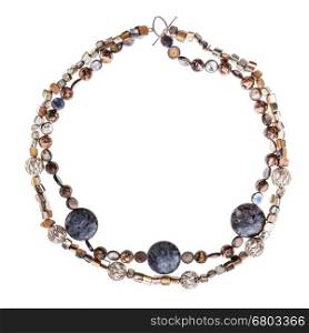 top view of round necklace from labradorite and rhodonite natural gem stones balls, abalon nacre beads isolated on white background
