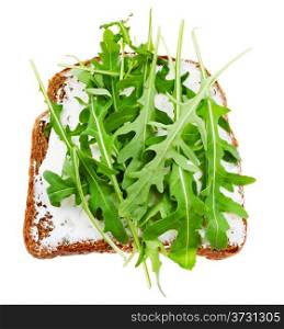 top view of sandwich from rye bread, soft cheese and fresh arugula isolated on white background