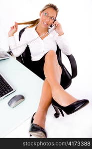 top view of smiling employee talking on phone against white background