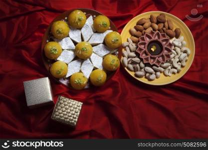 Top view of sweets , nuts and gifts