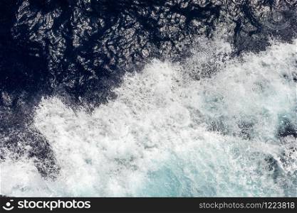 top view of the ocean with large waves from the ship. sea background. top view of the ocean with large waves from the ship. sea background.