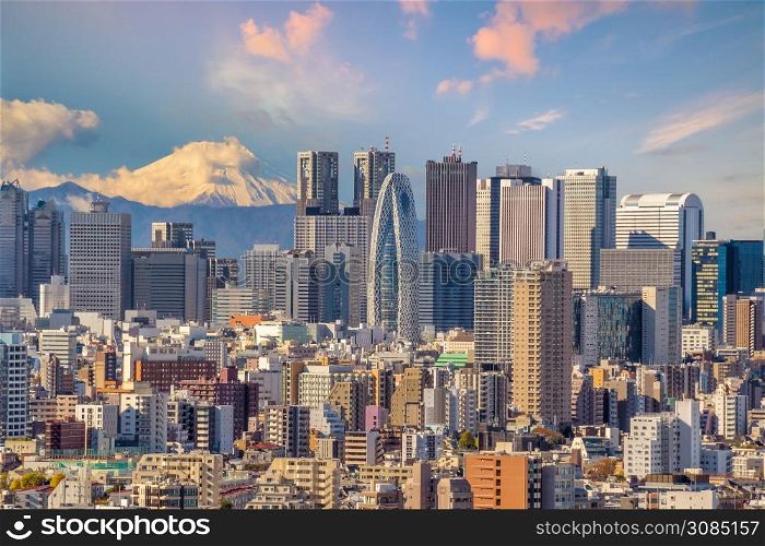 Top view of Tokyo city skyline (Shinjuku area) and Mount Fuji with beautiful sunset in Japan.