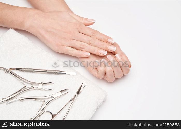 Top view of Tools of a manicure set on a white background.. Top view of Tools of a manicure set on a white background