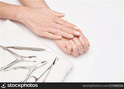 Top view of Tools of a manicure set on a white background.. Top view of Tools of a manicure set on a white background
