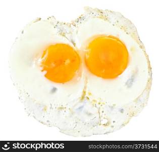 top view of two fry eggs isolated on white background