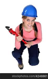 Top-view of woman holding wrench