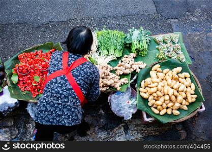 top view of woman selling fresh fruit and vegatables - Thailan