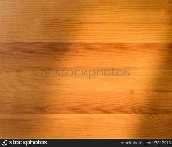 Top view of wooden table with shadow overlay. Top view of wooden table