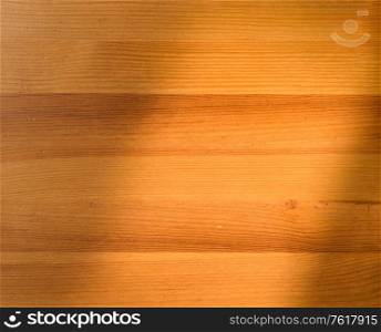 Top view of wooden table with shadow overlay. Top view of wooden table