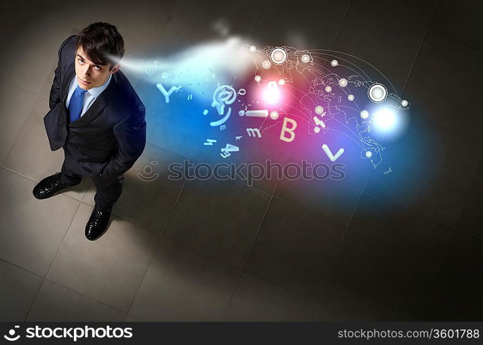 Top view of young businessman making decision