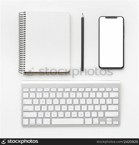top view office desk composition with phone