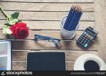Top view office desk laptop and coffee cup on wood table copy space. Tabletop notebook laptop coffee cup for officer display empty space on wooden background. Home business work from home workspace