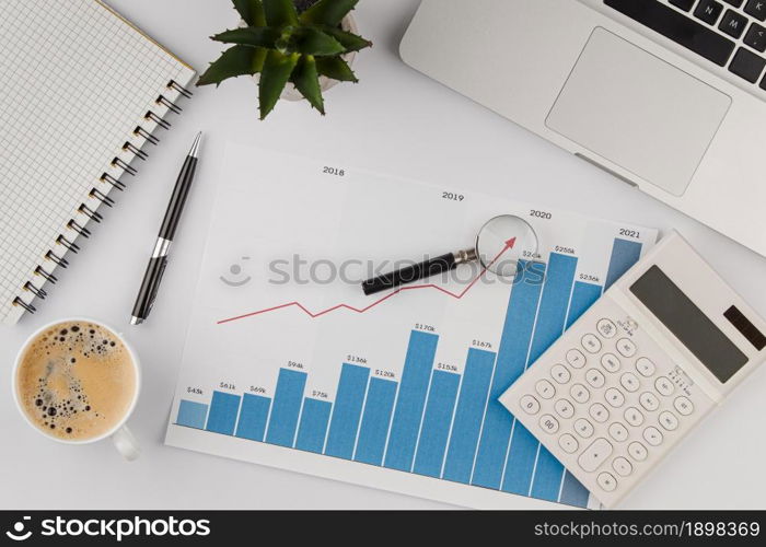 top view office desk with growth chart calculator. Resolution and high quality beautiful photo. top view office desk with growth chart calculator. High quality beautiful photo concept