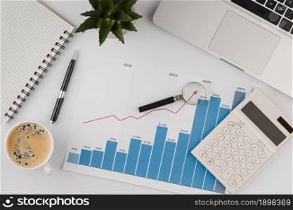 top view office desk with growth chart calculator. Resolution and high quality beautiful photo. top view office desk with growth chart calculator. High quality beautiful photo concept