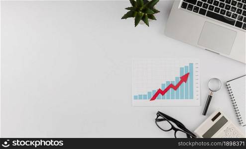 top view office desk with growth chart copy space. Resolution and high quality beautiful photo. top view office desk with growth chart copy space. High quality beautiful photo concept