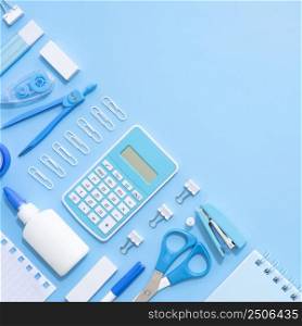 top view office stationery with calculator stapler