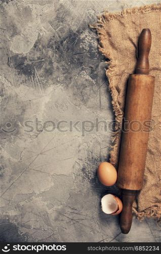 Top view on Old Kitchen cooking utensils on grey stone table - cooking concept