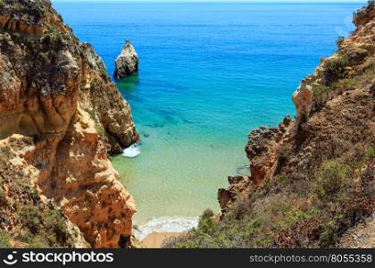 Top view on sandy beach Dos Tres Irmaos(Portimao, Alvor, Algarve, Portugal).