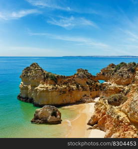 Top view on sandy beach Dos Tres Irmaos Portimao, Alvor, Algarve, Portugal .