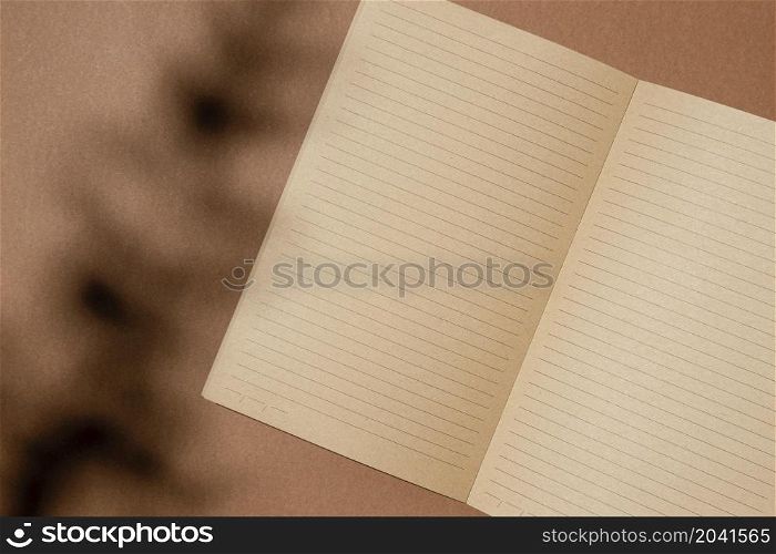 top view open brown paper notebook
