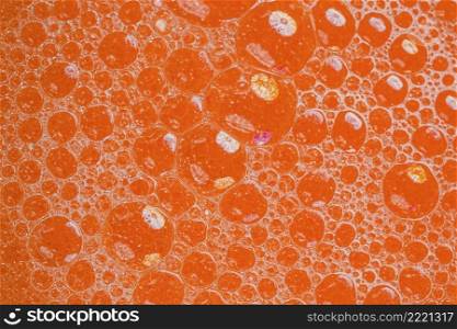 top view orange liquid background