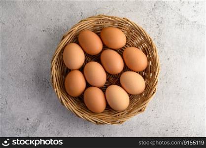 Top view Organic brown eggs several in a wicker basket, preparing preparing for cooking food or dessert, copy space