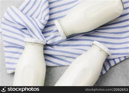 top view organic milk bottles cloth