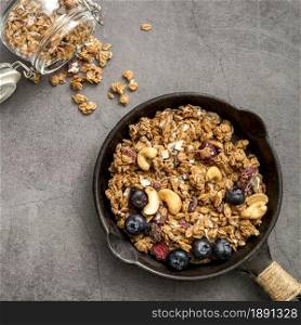 top view pan with delicious homemade granola. Resolution and high quality beautiful photo. top view pan with delicious homemade granola. High quality and resolution beautiful photo concept