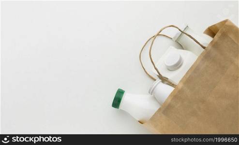 top view paper bag with milk bottles