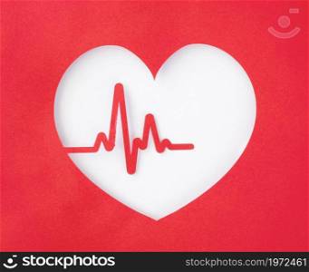 top view paper heart cut out with heartbeat. High resolution photo. top view paper heart cut out with heartbeat. High quality photo