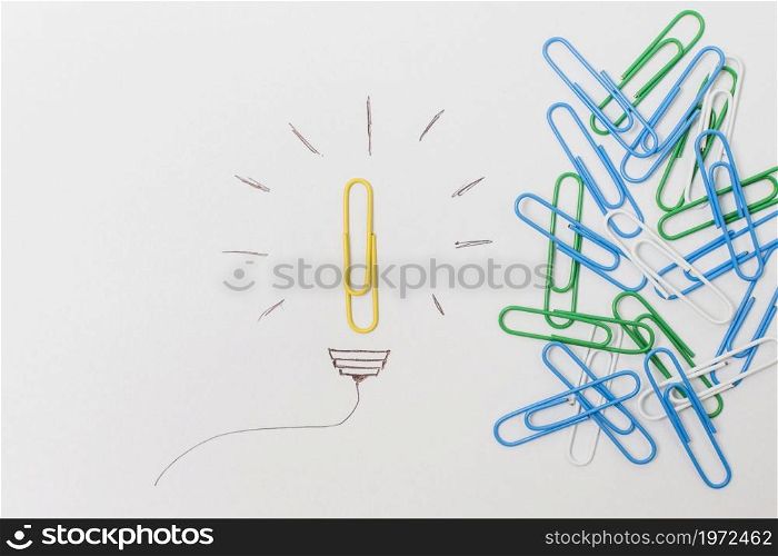 top view paperclip lightbulb. High resolution photo. top view paperclip lightbulb. High quality photo